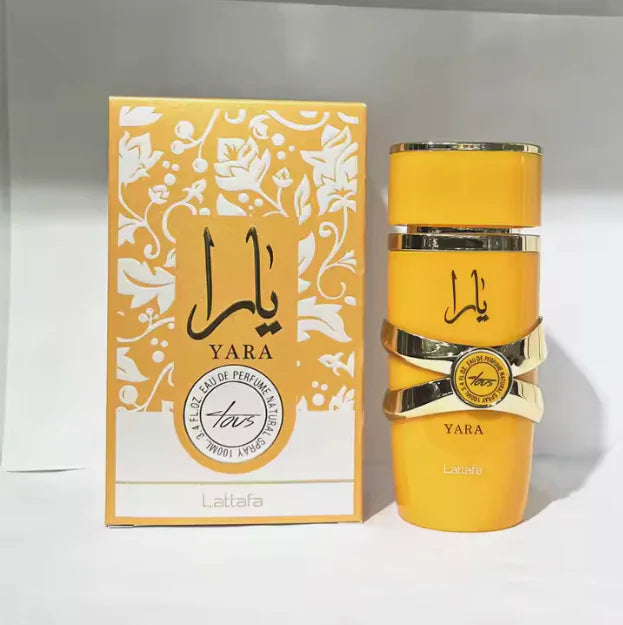 yara lattafa perfume surrounded by fresh flowers, complementing its fragrance