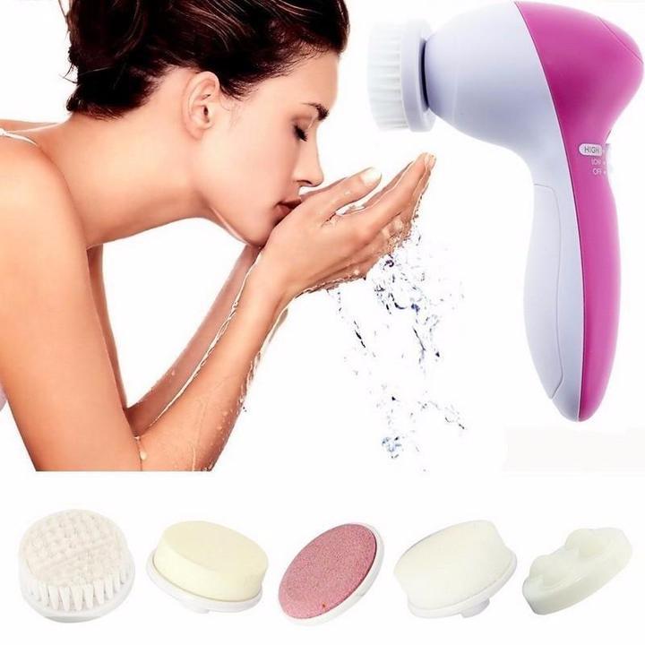 Electric Facial Cleansing Magic Momma with multiple brush heads